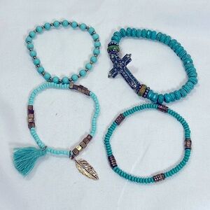 Set of four- turquoise bead bracelets.